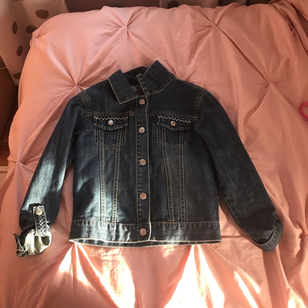 Dark blue jean jacket.
